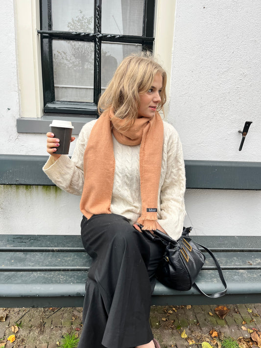Peach colored winter scarf